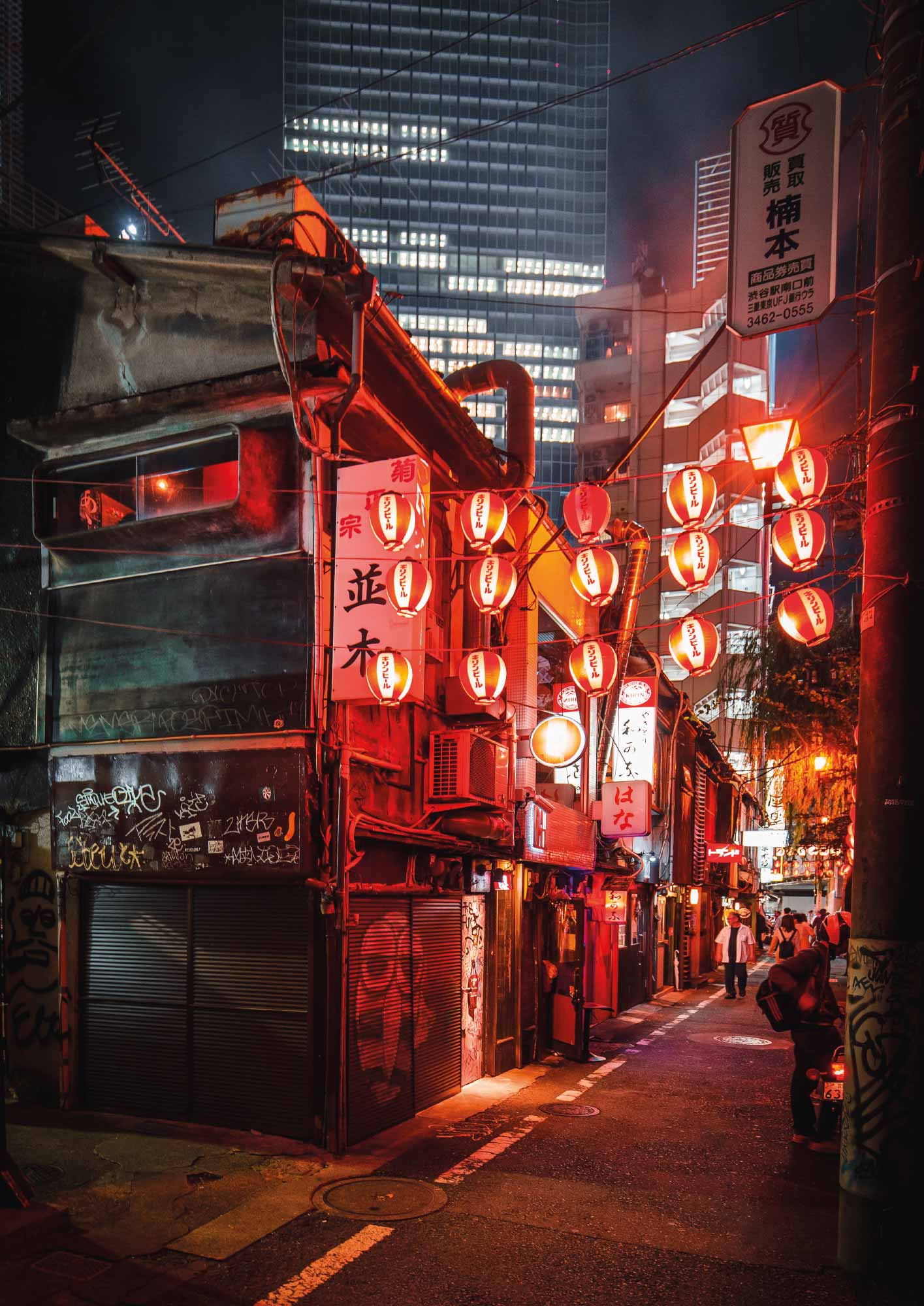 affiche de Tokyo de nuit dans un rue illuminé en rouge